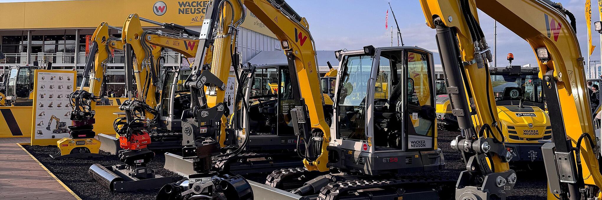 excavators with different attachments 