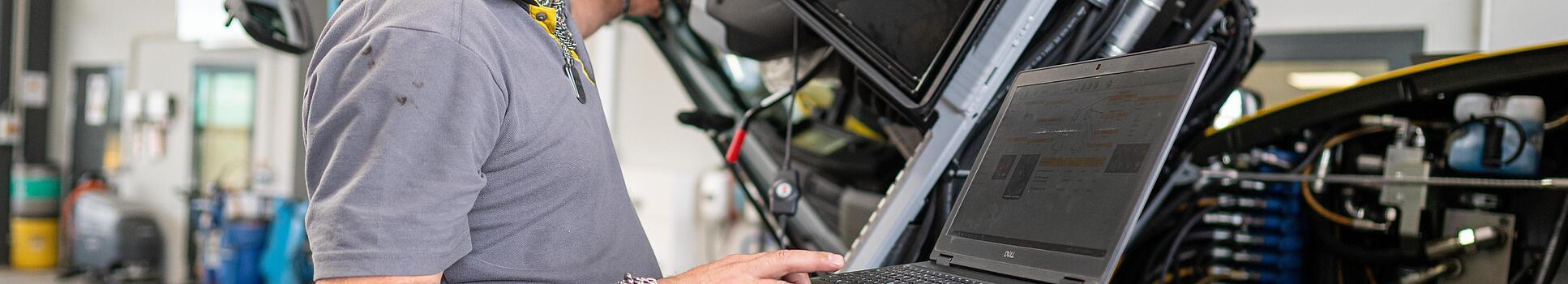 wacker neuson employee checks machine